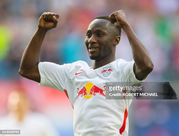 Leipzig's Guinean midfielder Naby Keita celebrates after scoring the 4-0 during the German first division Bundesliga football match between RB...