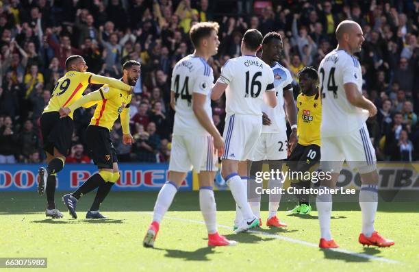 Miguel Britos of Watford celebrates scoring his sides first goal during the Premier League match between Watford and Sunderland at Vicarage Road on...