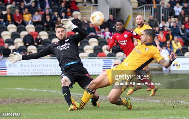 Glenn Morris of Crawley Town saves a shot from Joss Labadie of Newport County during the Sky Bet League Two match between Newport County and Crawley...
