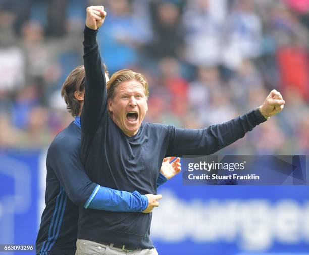 Markus Gisdol, head coach of Hamburg celebrates at the end of the Bundesliga match between Hamburger SV and 1. FC Koeln at Volksparkstadion on April...