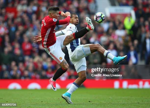 Marcos Rojo of Manchester United and Jose Salomon Rondon of West Bromwich Albion battle for possession during the Premier League match between...