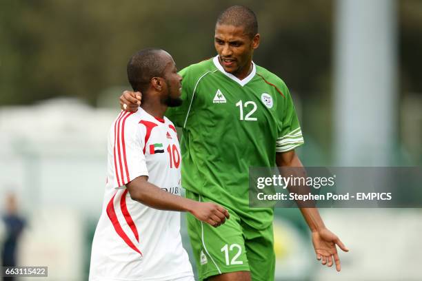 Algeria's Abderaouf Zarabi and United Arab Emirates' Ismail Matar.