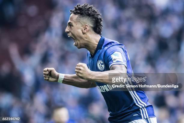Thilo Kehrer of Schalke celebrates his team's first goal during the Bundesliga match between FC Schalke 04 and Borussia Dortmund at Veltins-Arena on...