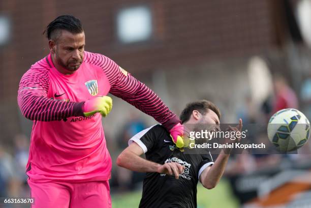 dillingen-germany-bernd-ostertag-of-haunsheim-is-challenged-by-tim-wiese-of-dillingen-during.jpg