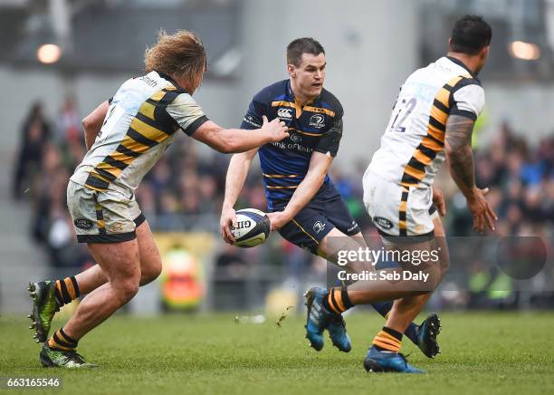 Leinster , Ireland - 1 April 2017; Jonathan Sexton of Leinster in action against Tommy Taylor, left, and Alapati Leiua of Wasps during the European...