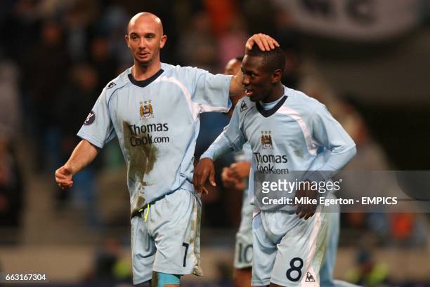 Manchester City's Shaun Wright-Phillips is congratulated on scoring the second goal of the game by team mate Stephen Ireland.