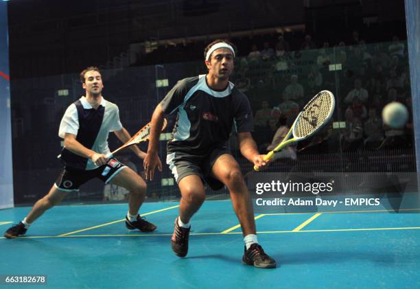 World number one Amr Shabana from Egypt in action against Germany's Simon Rosner