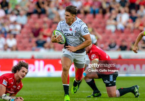 Kobus Van Wyk of the Sharks breaks the Lions defence during the Super Rugby match between Emirates Lions and Cell C Sharks at Emirates Airline Park...