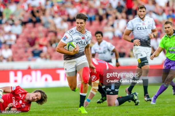 Kobus Van Wyk of the Sharks breaks the Lions defence during the Super Rugby match between Emirates Lions and Cell C Sharks at Emirates Airline Park...