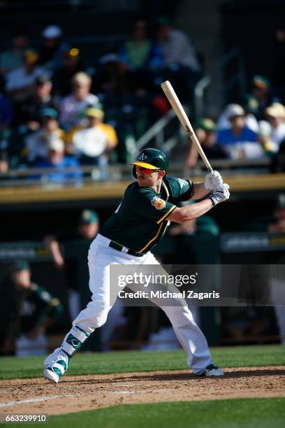 Chris Parmelee of the Oakland Athletics bats during the game against the Los Angeles Angels of Anaheim at Hohokam Stadium on February 26, 2017 in...
