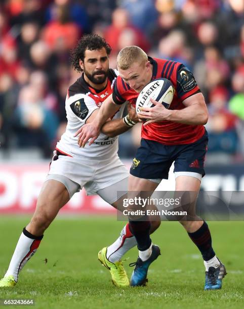 Munster , Ireland - 1 April 2017; Keith Earls of Munster is tackled by Yoann Huget of Toulouse during the European Rugby Champions Cup Quarter-Final...