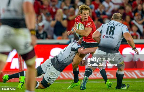 Andries Coetzee of the Lions with possession during the Super Rugby match between Emirates Lions and Cell C Sharks at Emirates Airline Park on April...