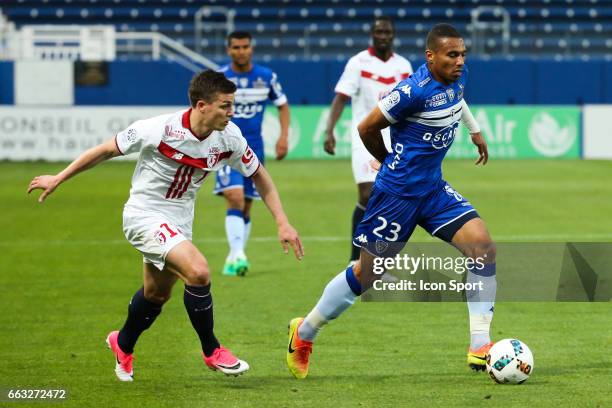 Nicolas de Preville of Lille and Alexander Djiku of Bastia during the French Ligue 1 match between Bastia and Lille at Stade Armand Cesari on April...