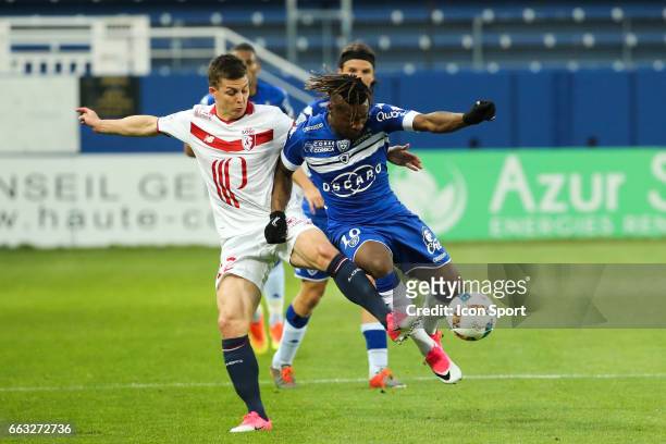Nicolas de Preville of Lille and Allan St Maximin of Bastia during the French Ligue 1 match between Bastia and Lille at Stade Armand Cesari on April...
