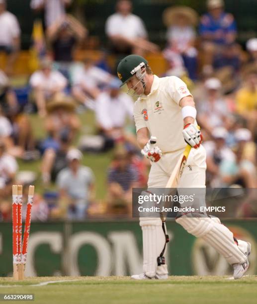 Australia's Brad Haddin walks off after being stumped by South Africa's Mark Boucher on day four of the first test.