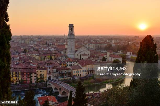 sunset in verona, italy - acqua fluente stock pictures, royalty-free photos & images