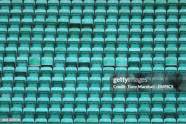 General view of empty green seats at Easter Road