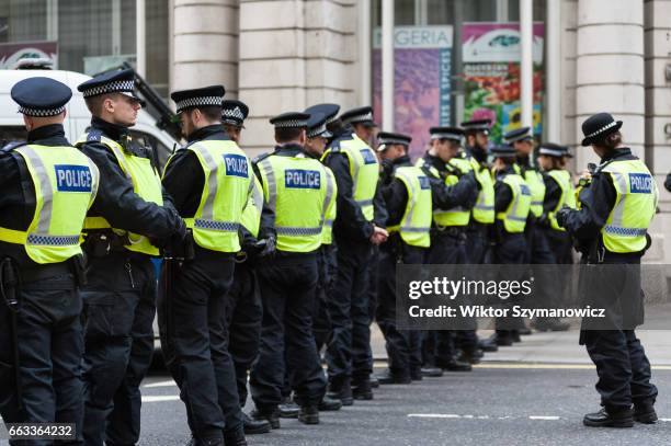 Large police contingent deployed in central London as members of anti-fascist groups, Unite Against Fascism and Antifaschistische Aktion oranise a...
