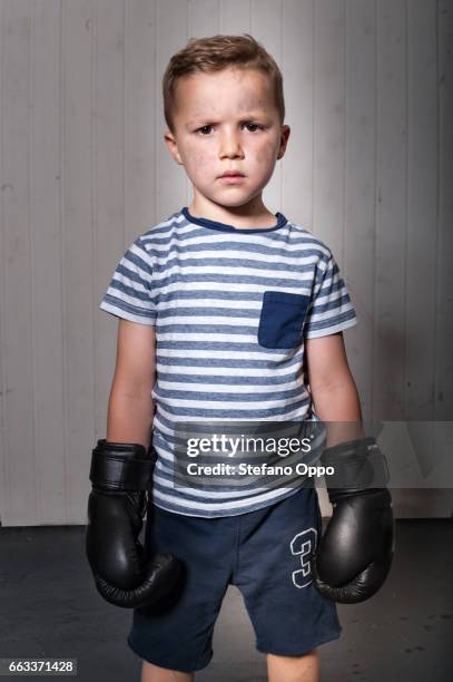 kid with boxing gloves - sfondo bianco stock pictures, royalty-free photos & images