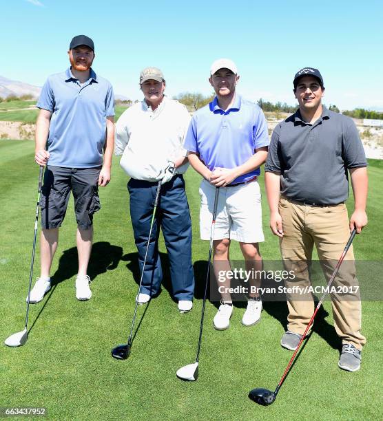 Singer-songwriters Eric Paslay and Scotty McCreery attend the ACM Lifting Lives Golf Classic at TPC Las Vegas on April 1, 2017 in Las Vegas, Nevada.