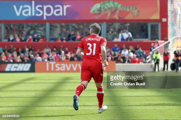Bastian Schweinsteiger of Chicago Fire jogs down the pitch in the second half against the Montreal Impact during an MLS match at Toyota Park on April...