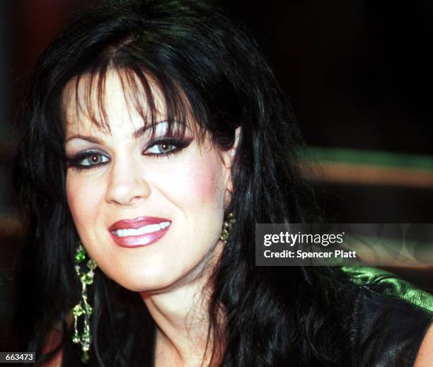 Professional wrestler Chyna poses for photographers September 28, 2000 at the World Wrestling Federation restaurant and shop in New York City. Chyna...