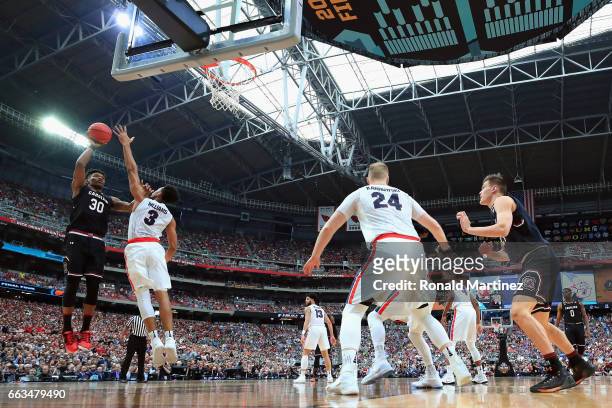 Chris Silva of the South Carolina Gamecocks shoots against Johnathan Williams of the Gonzaga Bulldogs in the first half during the 2017 NCAA Men's...