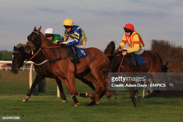 The Wicketkeeper ridden by Tom Scudamore tangles with King De Lune ridden by Sean Quinlan during the To Book The Restaurant Call 08445 793007...