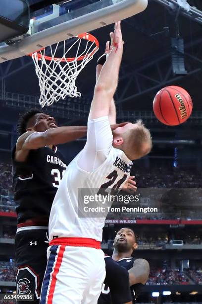 Chris Silva of the South Carolina Gamecocks hits Przemek Karnowski of the Gonzaga Bulldogs in the face in the first half during the 2017 NCAA Men's...