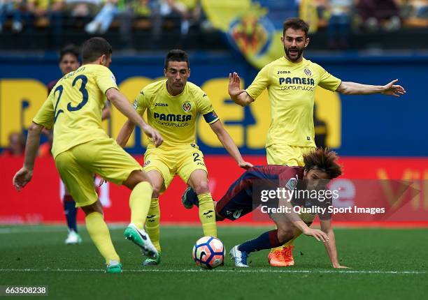 Daniele Bonera Bruno Soriano and Adrian Lopez of Villarreal competes for the ball with Takashi Inui of Eibar during the La Liga match between...