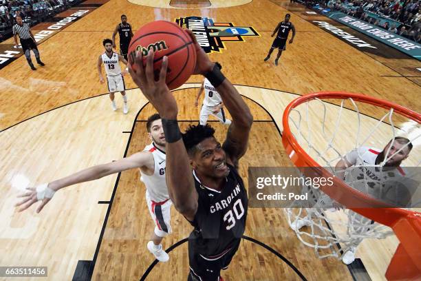 Chris Silva of the South Carolina Gamecocks goes up for a dunk in the first half against the Gonzaga Bulldogs during the 2017 NCAA Men's Final Four...