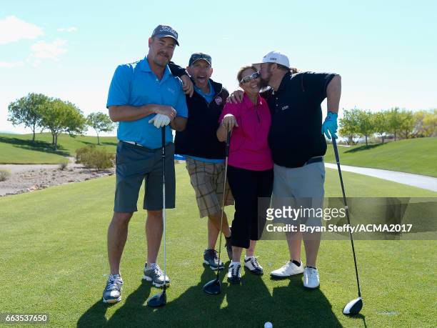 Gayle Holcomb and rapper Colt Ford attend the ACM Lifting Lives Golf Classic at TPC Las Vegas on April 1, 2017 in Las Vegas, Nevada.