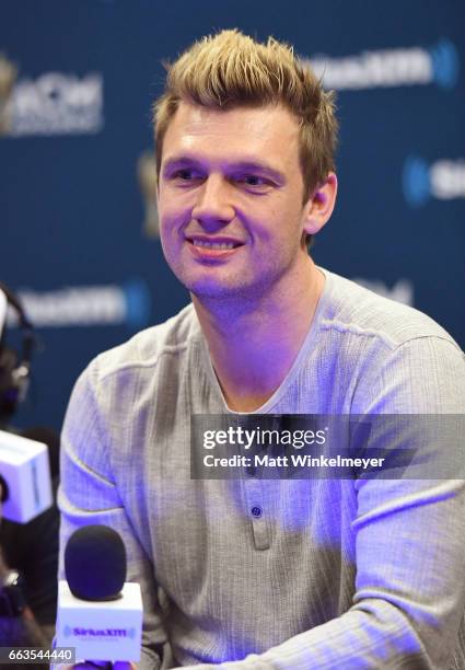 Singer Nick Carter of Backstreet Boys speaks during SiriusXM's The Highway Channel broadcasts leading up to the ACM Awards at T-Mobile Arena on April...