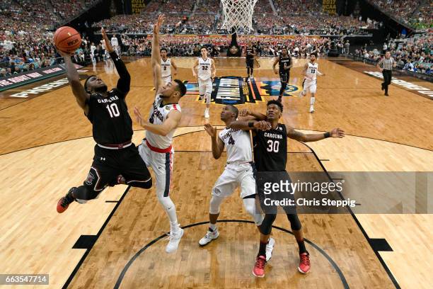 Duane Notice of the South Carolina Gamecocks takes a jumpshot over Nigel Williams-Goss of the Gonzaga Bulldogs during the 2017 NCAA Photos via Getty...