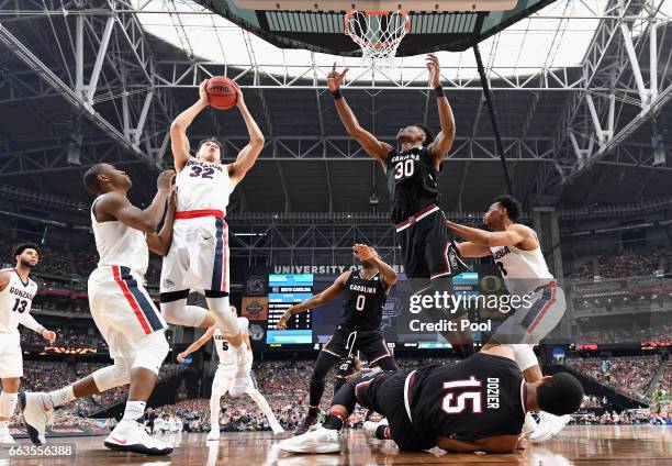 Zach Collins of the Gonzaga Bulldogs goes up with the ball against Chris Silva of the South Carolina Gamecocks in the second half during the 2017...