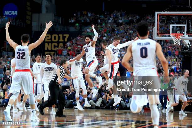 The Gonzaga Bulldogs celebrate after defeating the South Carolina Gamecocks during the 2017 NCAA Men's Final Four Semifinal at University of Phoenix...