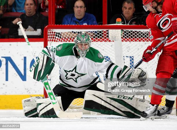 Kari Lehtonen of the Dallas Stars makes a glove save during an NHL game against the Carolina Hurricanes on April 1, 2017 at PNC Arena in Raleigh,...