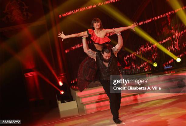 Italian rugby player Martin Castrogiovanni and his dance partner Sara Di Vaira perform on the Italian TV show 'Ballando Con Le Stelle' at Auditorium...