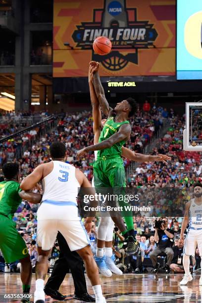 Tip-off against Jordan Bell of the Oregon Ducks and Isaiah Hicks of the North Carolina Tar Heels during the 2017 NCAA Photos via Getty Images Men's...