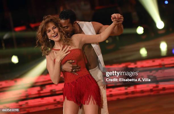 Italian actress Giuliana De Sio and her dance partner Maykel Fonts perform on the Italian TV show 'Ballando Con Le Stelle' at Auditorium Rai on April...