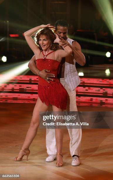 Italian actress Giuliana De Sio and her dance partner Maykel Fonts perform on the Italian TV show 'Ballando Con Le Stelle' at Auditorium Rai on April...