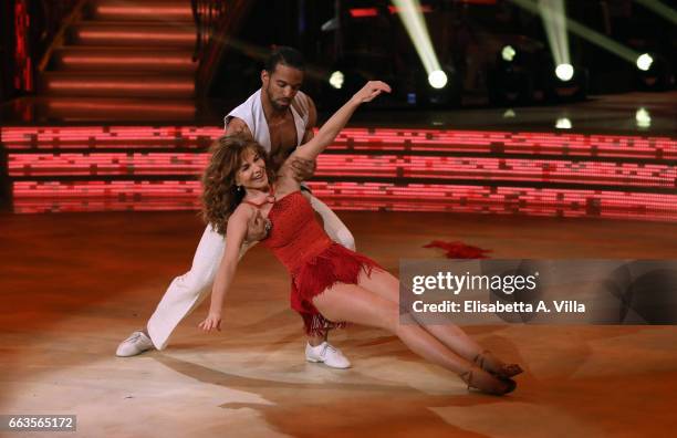 Italian actress Giuliana De Sio and her dance partner Maykel Fonts perform on the Italian TV show 'Ballando Con Le Stelle' at Auditorium Rai on April...