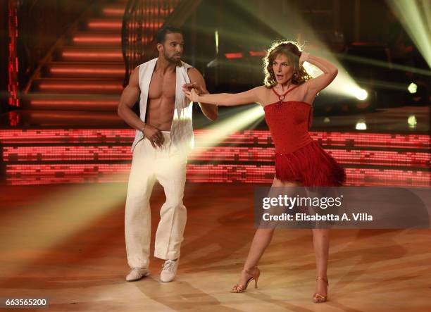Italian actress Giuliana De Sio and her dance partner Maykel Fonts perform on the Italian TV show 'Ballando Con Le Stelle' at Auditorium Rai on April...