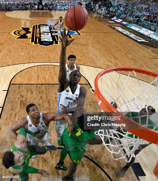 Theo Pinson of the North Carolina Tar Heels shoots the ball over Jordan Bell of the Oregon Ducks during the 2017 NCAA Photos via Getty Images Men's...