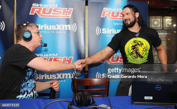 Dave LaGreca and Wrestler Drew Galloway meet during SiriusXM's Busted Open Live From WrestleMania 33on April 1, 2017 in Orlando City.