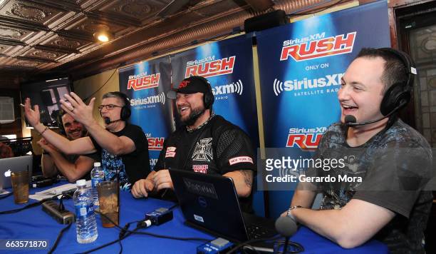 Larry Dallas, Dave LaGreca, Wrestler Bully Ray and Doug Mortman laugh during the SiriusXM's Busted Open Live From WrestleMania 33on April 1, 2017 in...
