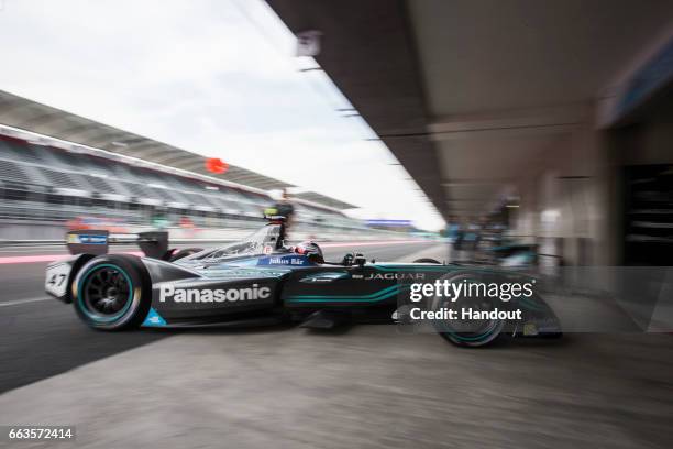 In this handout image supplied by Formula E, Adam Carroll of Great Britain driving the Panasonic Jaguar Racing Jaguar I-TYPE car during the Mexico...