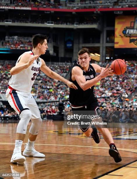 Maik Kotsar of the South Carolina Gamecocks is defended by Zach Collins of the Gonzaga Bulldogs during the 2017 NCAA Photos via Getty Images Men's...