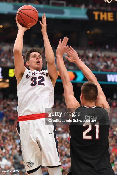 Zach Collins of the Gonzaga Bulldogs attempts a shot defended by Maik Kotsar of the South Carolina Gamecocks during the 2017 NCAA Photos via Getty...