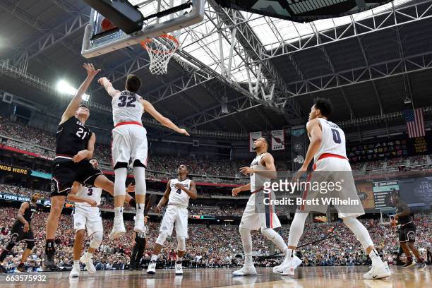 Rui Hachimura of the Gonzaga Bulldogs attempts a shot defended by Zach Collins of the Gonzaga Bulldogs during the 2017 NCAA Photos via Getty Images...